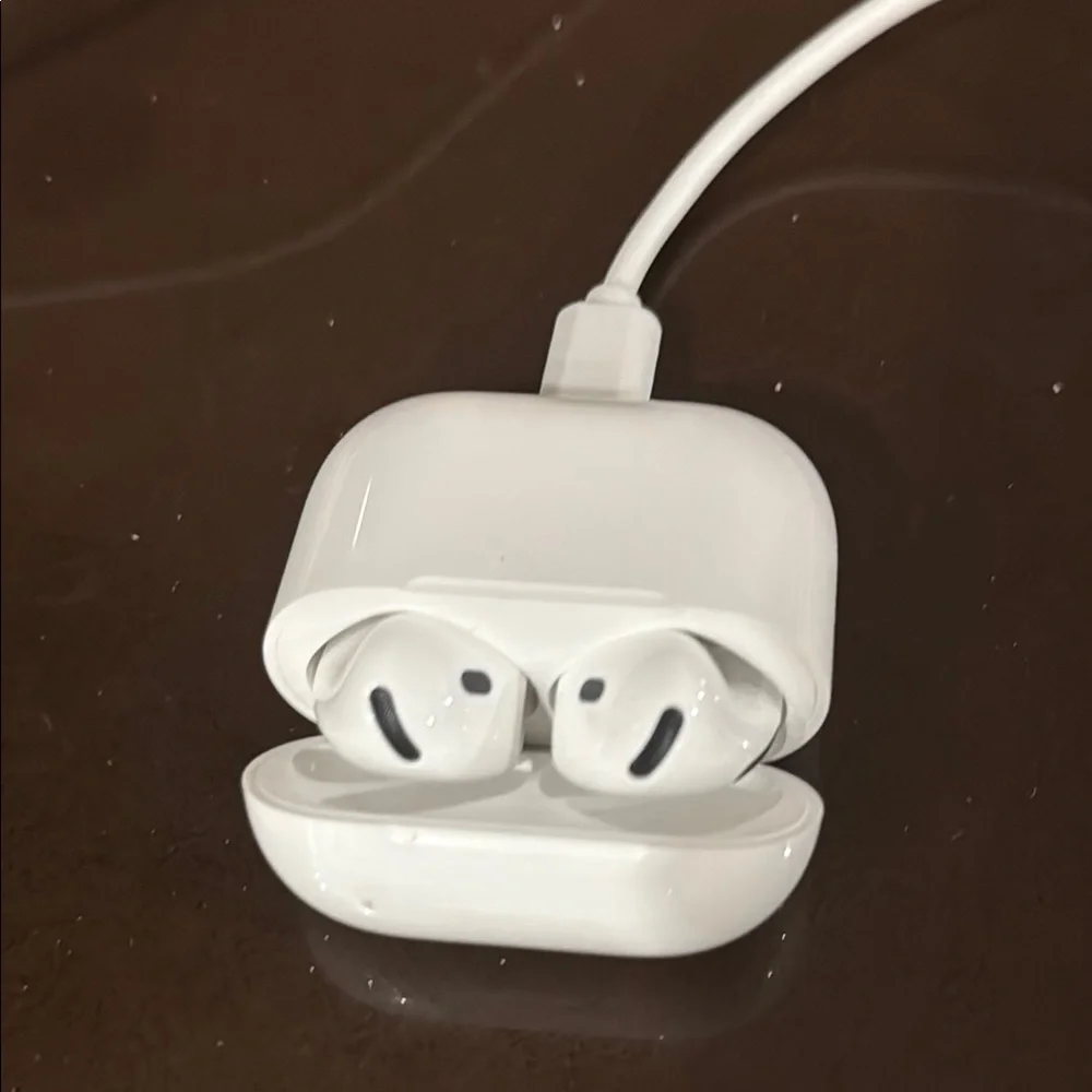 Apple AirPods Wireless Earbuds with Charging Cable